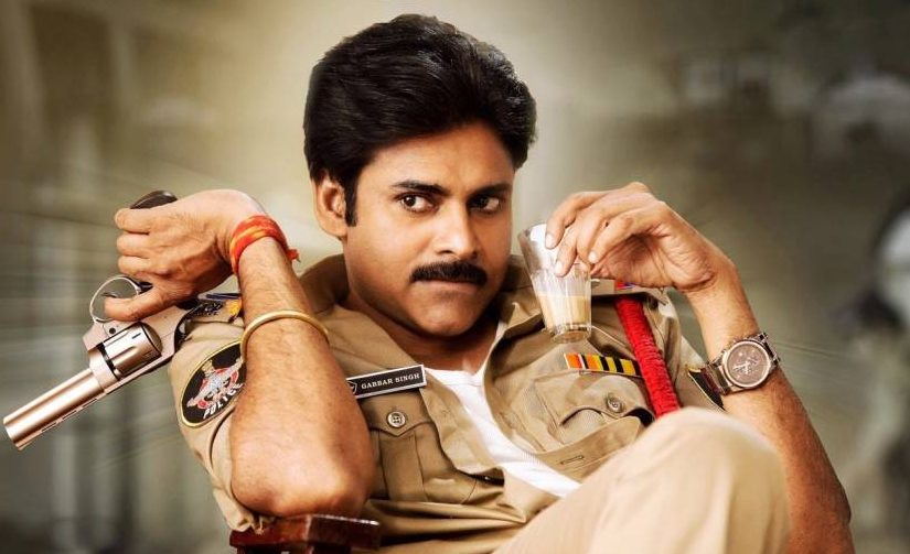 Pawan Kalyan holding glass tumbler in his Gabbar Singh movie